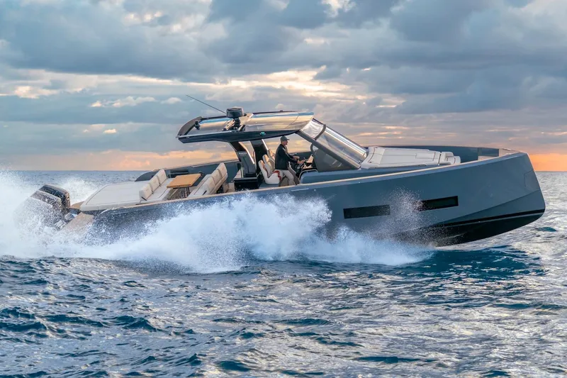 Slide: The Image of 2026 Pardo Yachts P43R cruising on ocean at sunset, showcasing sleek design and luxury. - 27