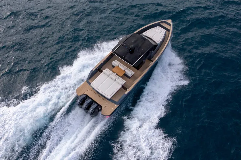 Slide: The Image of 2026 Pardo Yachts P43R cruising on open water, aerial view. - 29