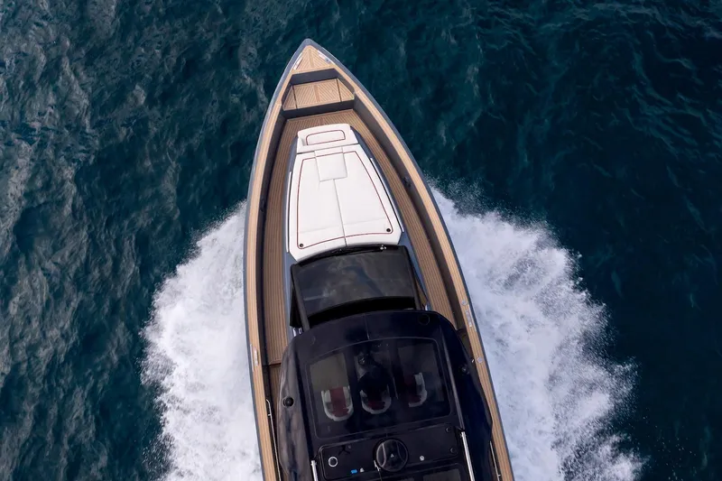 Slide: The Image of Top view of 2026 Pardo Yachts P43R cruising on open water. - 32