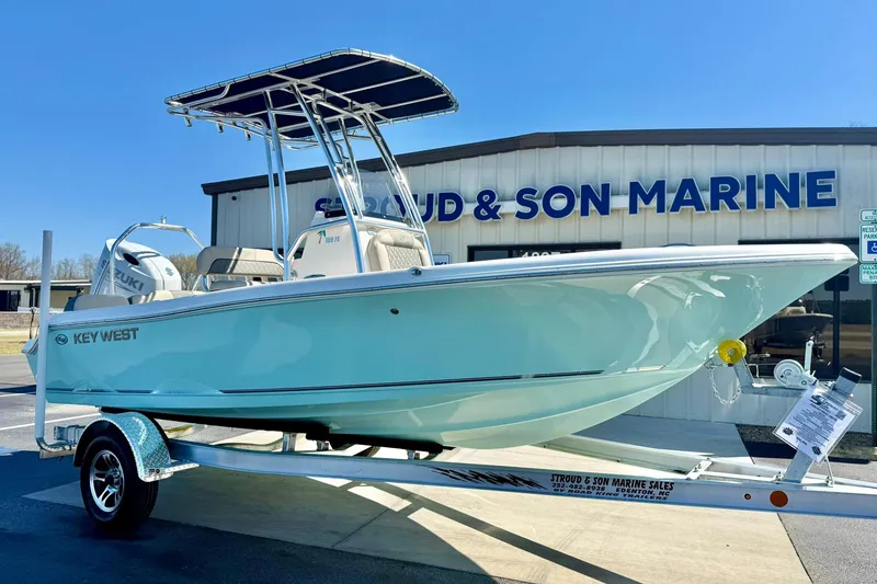 The Image of 2026 Key West 189 FS boat on trailer at Stroud & Son Marine dealership. - 1