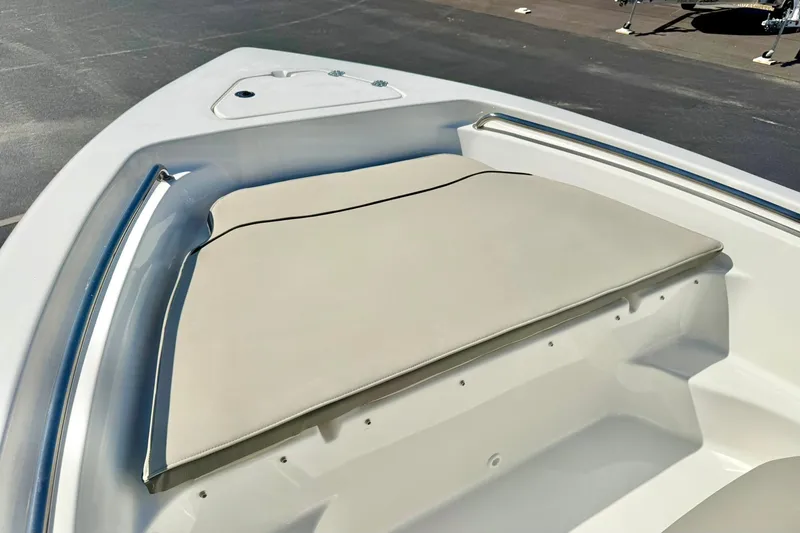 Slide: The Image of 2026 Key West 189 FS boat bow with cushioned seating and sleek design. - 10