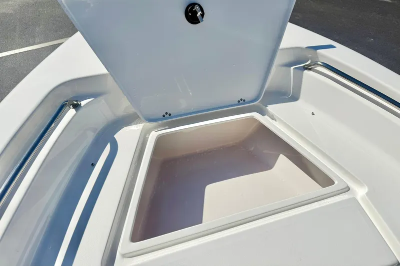 Slide: The Image of Open storage compartment on 2026 Key West 189 FS boat deck. - 12