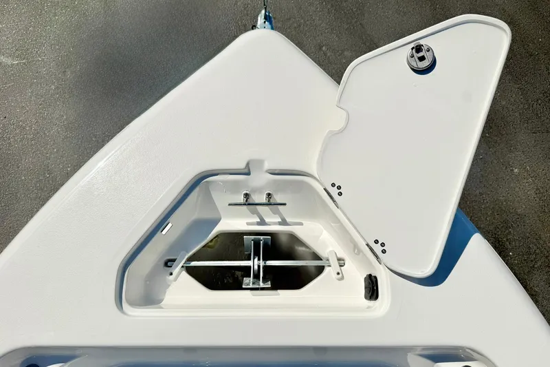 Slide: The Image of Open storage compartment on 2026 Key West 189 FS boat deck. - 13