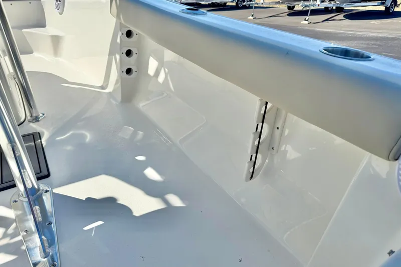 Slide: The Image of Interior view of a 2026 Key West 189 FS boat, showcasing sleek design and cup holders. - 29