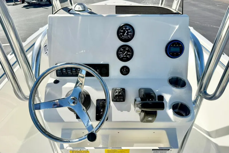 Slide: The Image of Steering console of 2026 Key West 189 FS boat with gauges and controls. - 3