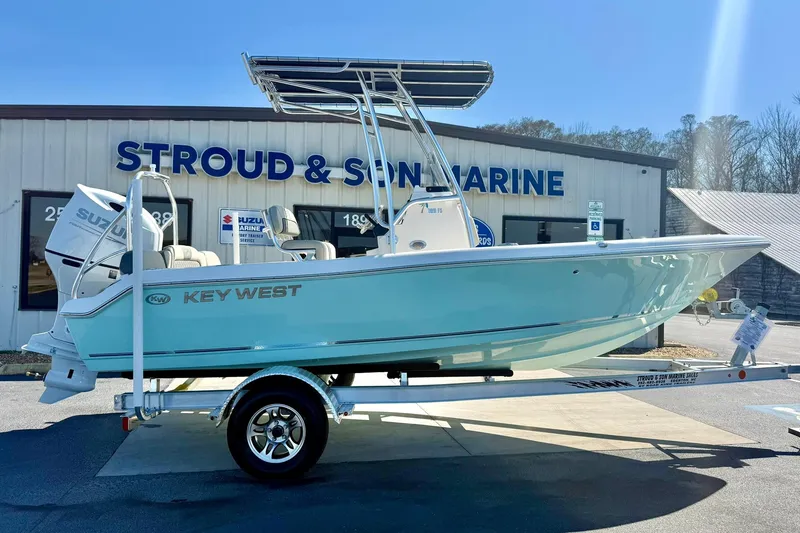Slide: The Image of 2026 Key West 189 FS boat on trailer at Stroud & Son Marine dealership. - 7
