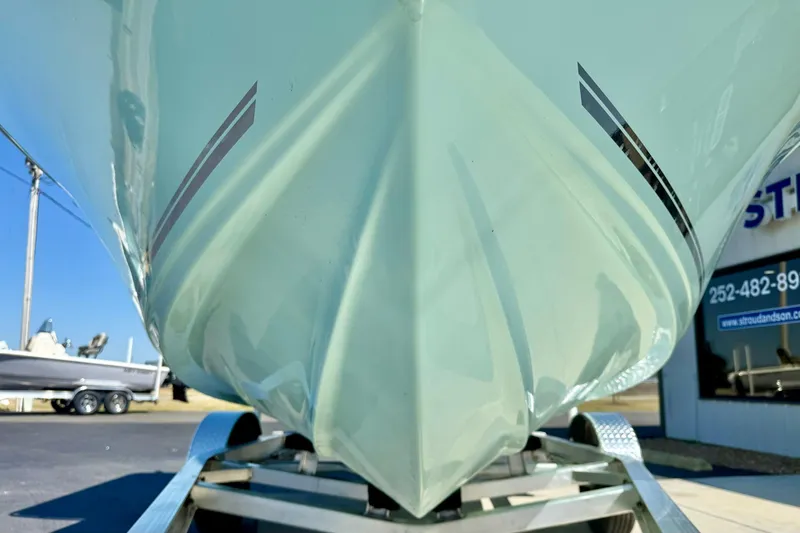 Slide: The Image of 2026 Key West 189 FS boat on trailer, showcasing sleek hull design. - 9