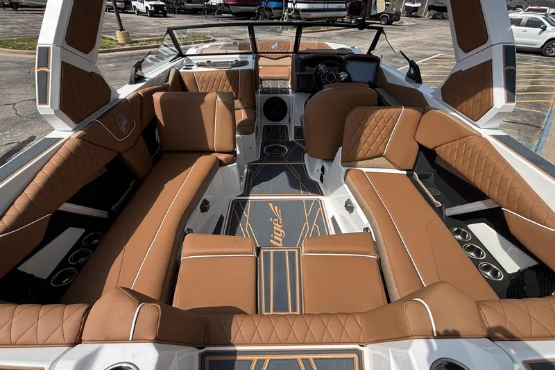 Slide: The Image of Luxurious interior of 2026 Tigé Z3 boat with tan leather seating and modern design. - 22