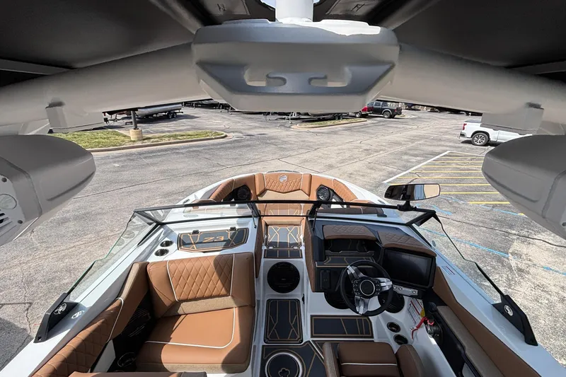 Slide: The Image of Interior view of 2026 Tigé Z3 boat with luxurious seating and modern dashboard. - 23