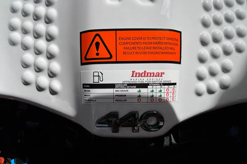 Slide: The Image of Engine cover of 2026 Tigé Z3 with fuel guidelines and warning label. - 29
