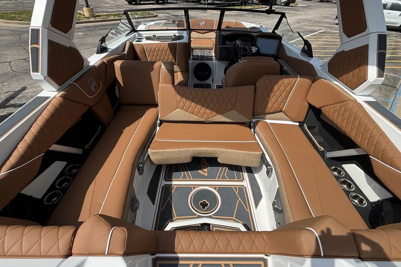 Slide: The Image of Luxurious interior of 2026 Tigé Z3 boat with brown leather seating and modern design. - 33