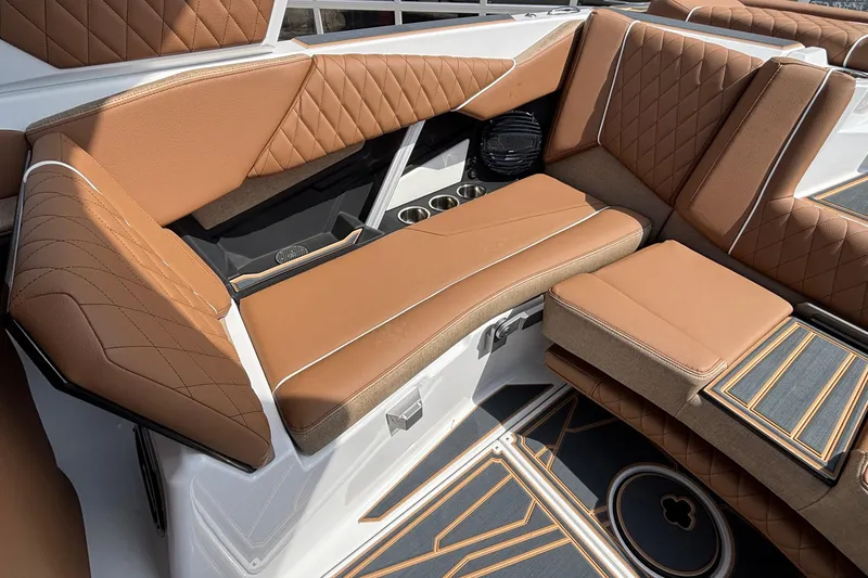 Slide: The Image of Luxurious interior seating of 2026 Tigé Z3 boat with brown diamond-stitched upholstery. - 36