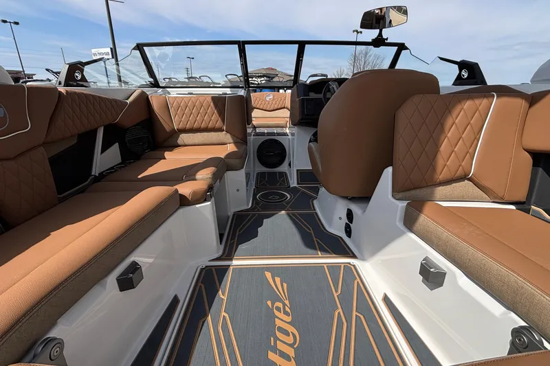 Slide: The Image of 2026 Tigé Z3 boat interior with luxurious brown seating and modern design. - 40