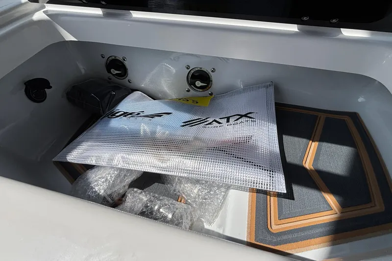 Slide: The Image of Storage compartment of 2026 Tigé Z3 boat with accessories and packaging. - 45