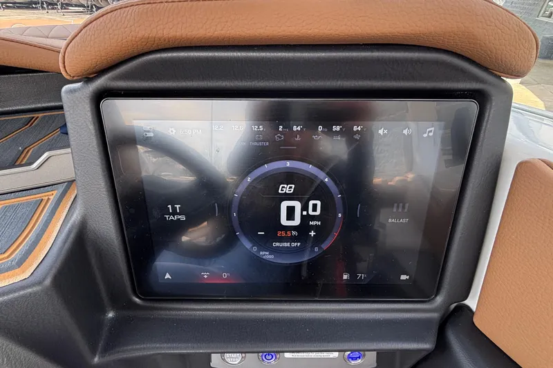 Slide: The Image of 2026 Tigé Z3 dashboard display showing speedometer and controls. - 48