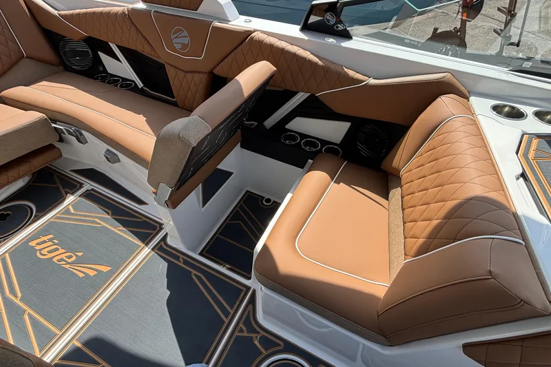 Slide: The Image of Luxurious interior of 2026 Tigé Z3 boat with tan leather seating and stylish flooring. - 49