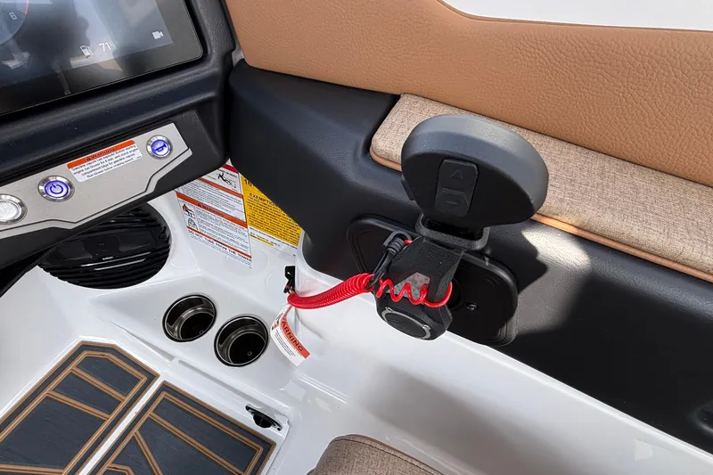 Slide: The Image of 2026 Tigé Z3 boat interior with control panel and safety features. - 57