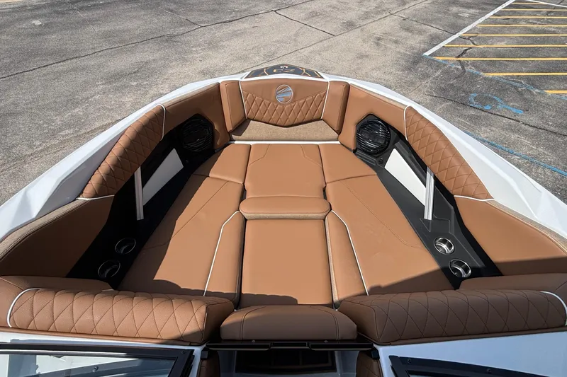 Slide: The Image of 2026 Tigé Z3 boat interior with luxurious brown leather seating and modern design. - 61