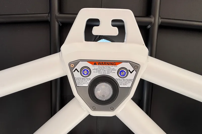 Slide: The Image of 2026 Tigé Z3 boat tower with warning label and control buttons. - 69