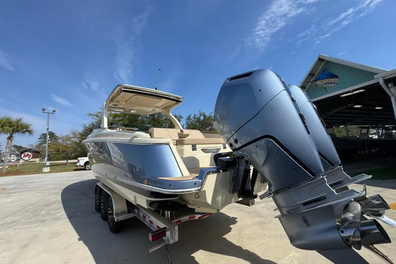 Slide: The Image of 2026 Chris-Craft Launch 35 GT boat with powerful outboard motor on trailer. - 15