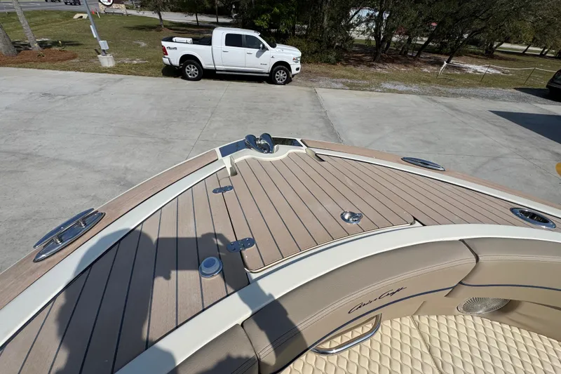 Slide: The Image of 2026 Chris-Craft Launch 35 GT boat deck with elegant wood finish and luxurious seating. - 19