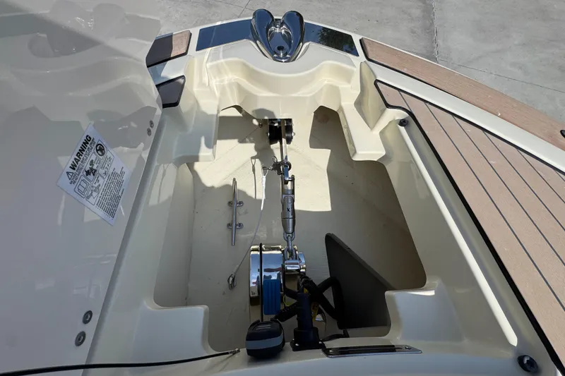 Slide: The Image of Anchor compartment of 2026 Chris-Craft Launch 35 GT boat, featuring modern design and equipment. - 20