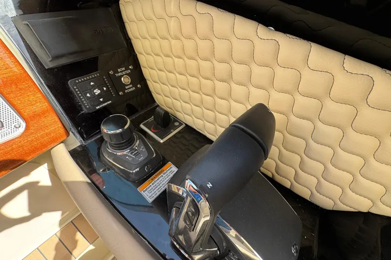 Slide: The Image of 2026 Chris-Craft Launch 35 GT boat controls with joystick and bow thruster. - 28