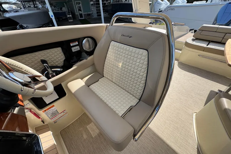 Slide: The Image of 2026 Chris-Craft Launch 35 GT interior with luxurious seating and modern steering wheel design. - 29