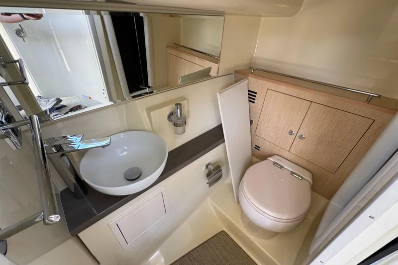 Slide: The Image of Luxurious bathroom interior of 2026 Chris-Craft Launch 35 GT boat, featuring modern sink and toilet. - 33
