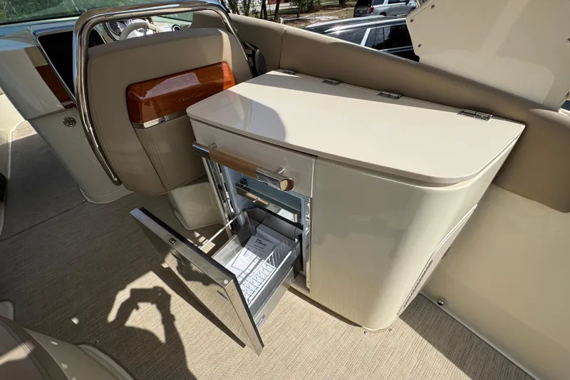 Slide: The Image of Interior of 2026 Chris-Craft Launch 35 GT with open storage compartment. - 37