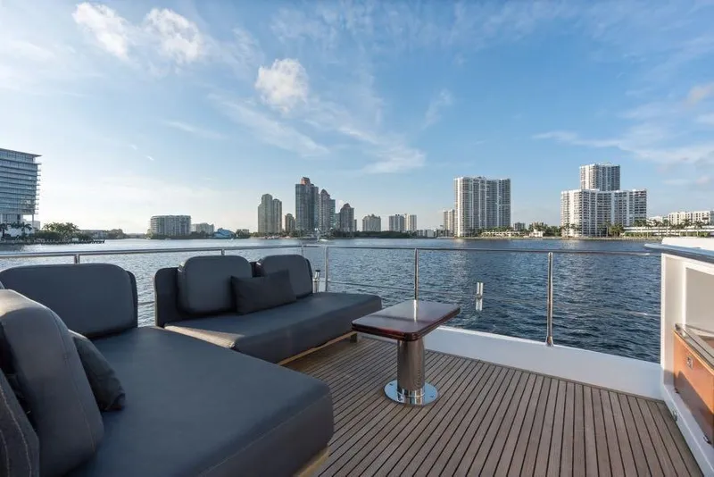 Slide: The Image of Luxurious deck of 2017 Azimut 66 yacht with city skyline view. - 11