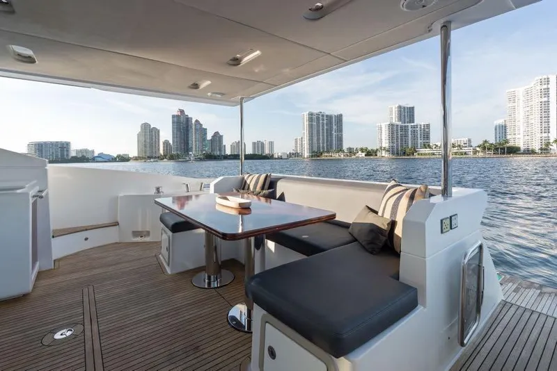 Slide: The Image of Luxurious 2017 Azimut 66 yacht deck with city skyline view. - 16