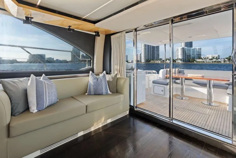 Slide: The Image of Luxurious interior of 2017 Azimut 66 yacht with waterfront view and elegant seating. - 19