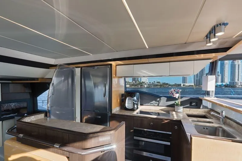 Slide: The Image of Luxurious kitchen interior of 2017 Azimut 66 yacht with modern appliances and scenic view. - 21