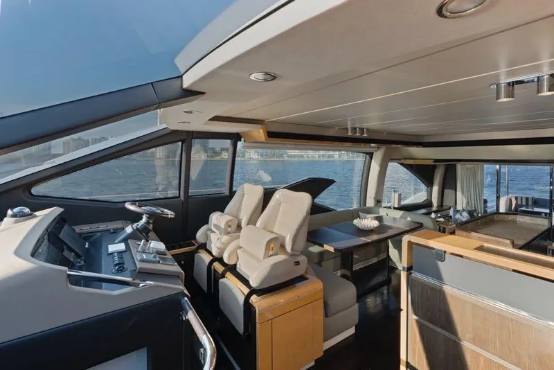 Slide: The Image of Luxurious interior of a 2017 Azimut 66 yacht with modern helm and seating. - 22