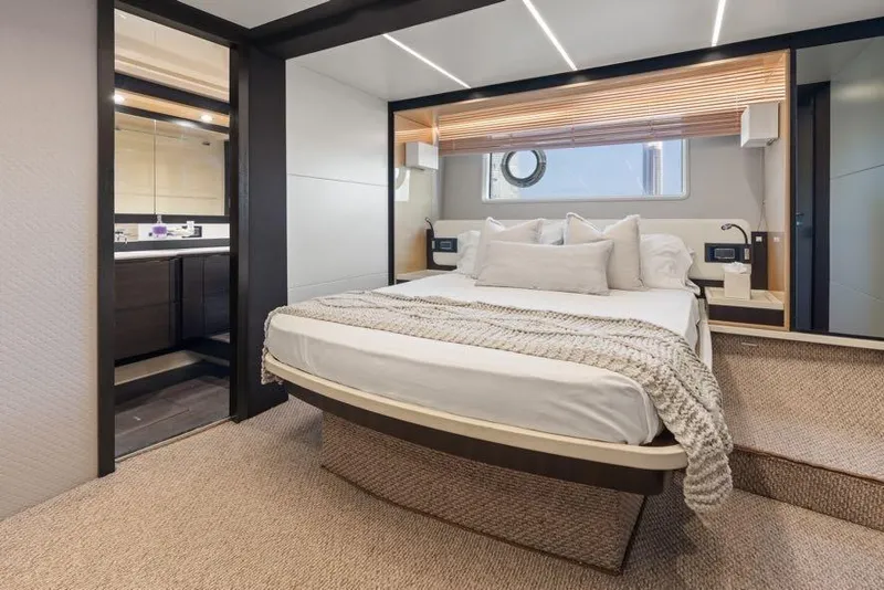 Slide: The Image of Luxurious bedroom interior of 2017 Azimut 66 yacht with modern design and cozy bedding. - 26