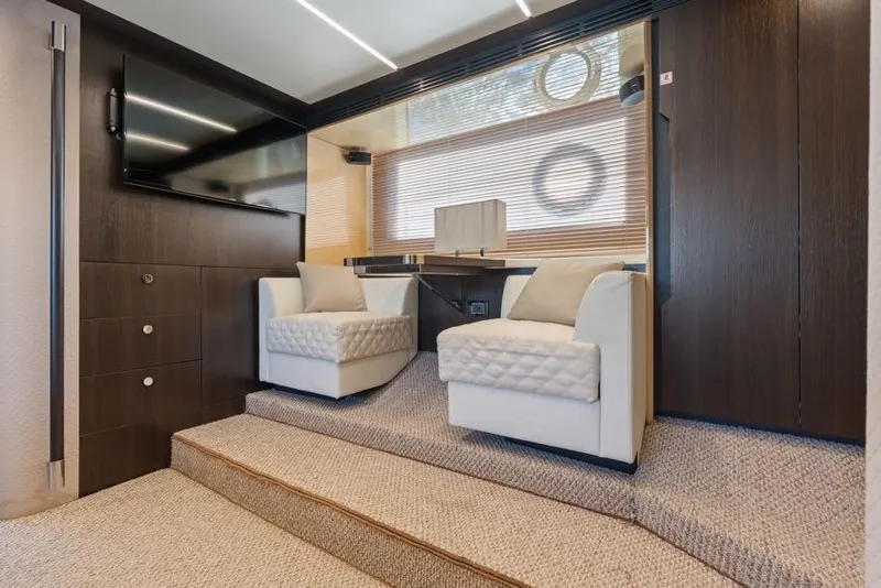 Slide: The Image of Luxurious interior of 2017 Azimut 66 yacht with modern seating and elegant decor. - 27