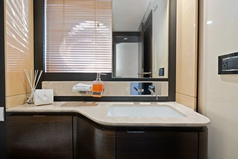 Slide: The Image of Luxurious bathroom interior of 2017 Azimut 66 yacht with modern fixtures and elegant design. - 30