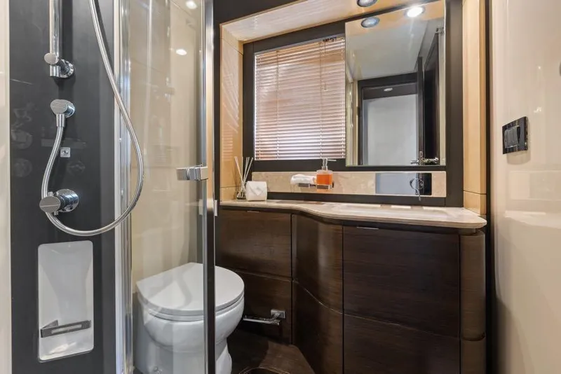 Slide: The Image of Luxurious bathroom in 2017 Azimut 66 yacht with modern fixtures and elegant design. - 31