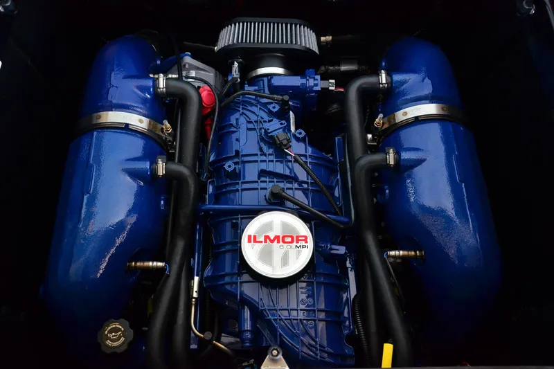 Slide: The Image of 2023 MasterCraft NXT23 Ilmor engine, blue components, detailed view. - 17