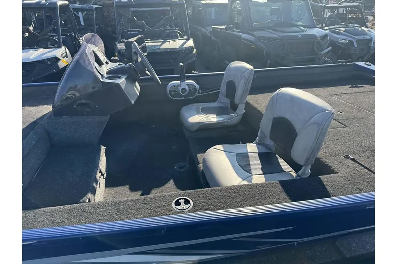 Slide: The Image of 2020 Crestliner 1700 boat interior with two seats and steering console. - 5