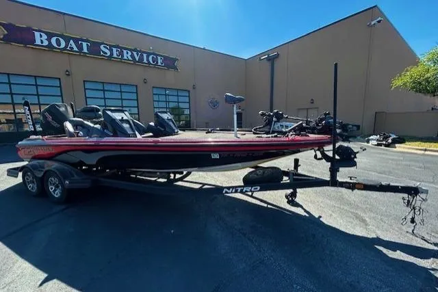 Slide: The Image of 2019 Nitro Z21 Elite boat on trailer outside service center. - 2