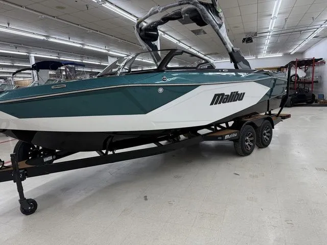Slide: The Image of 2026 Malibu Wakesetter 23 LSV boat in a showroom. - 4