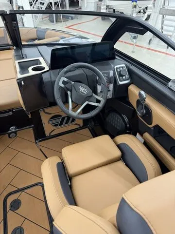 Slide: The Image of Interior of 2026 Malibu Wakesetter 23 LSV with luxurious steering wheel and seats. - 6