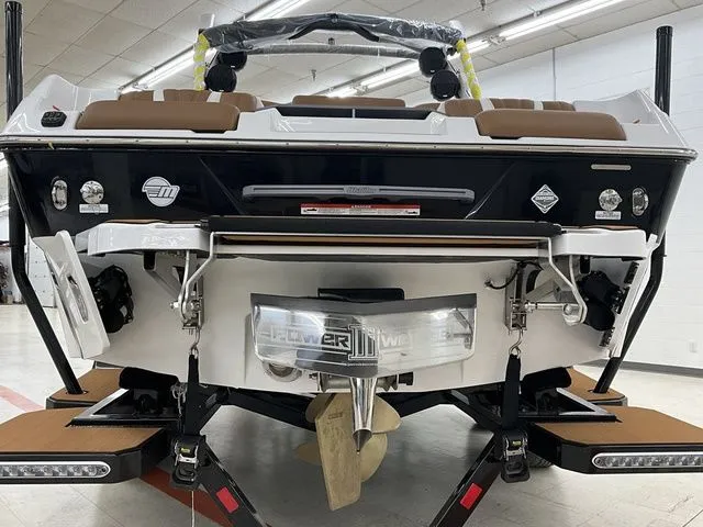 Slide: The Image of Rear view of 2026 Malibu Wakesetter 22 LSV in showroom. - 4