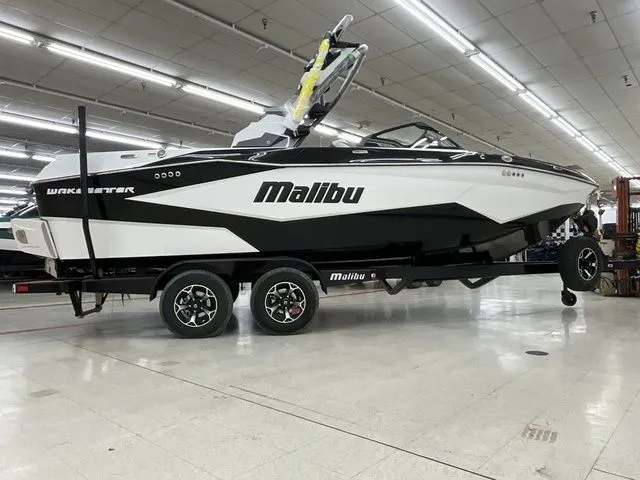 Slide: The Image of 2026 Malibu Wakesetter 22 LSV boat in a showroom. - 5