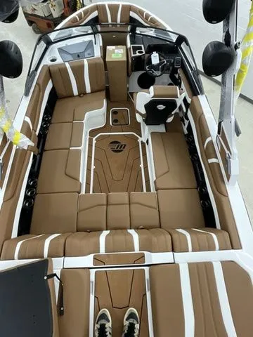 Slide: The Image of Interior of 2026 Malibu Wakesetter 22 LSV, brown upholstery. - 7