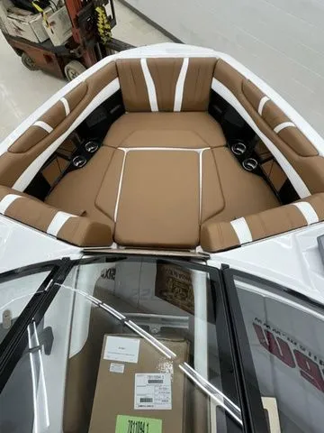 Slide: The Image of 2026 Malibu Wakesetter 22 LSV interior with brown seating. - 8