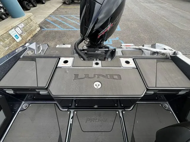 Slide: The Image of 2026 Lund 202 PRO-V GL Sport boat with motor view. - 12