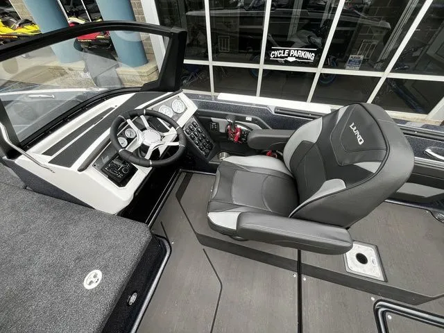 Slide: The Image of Interior of 2026 Lund 202 PRO-V GL Sport boat with steering console. - 20